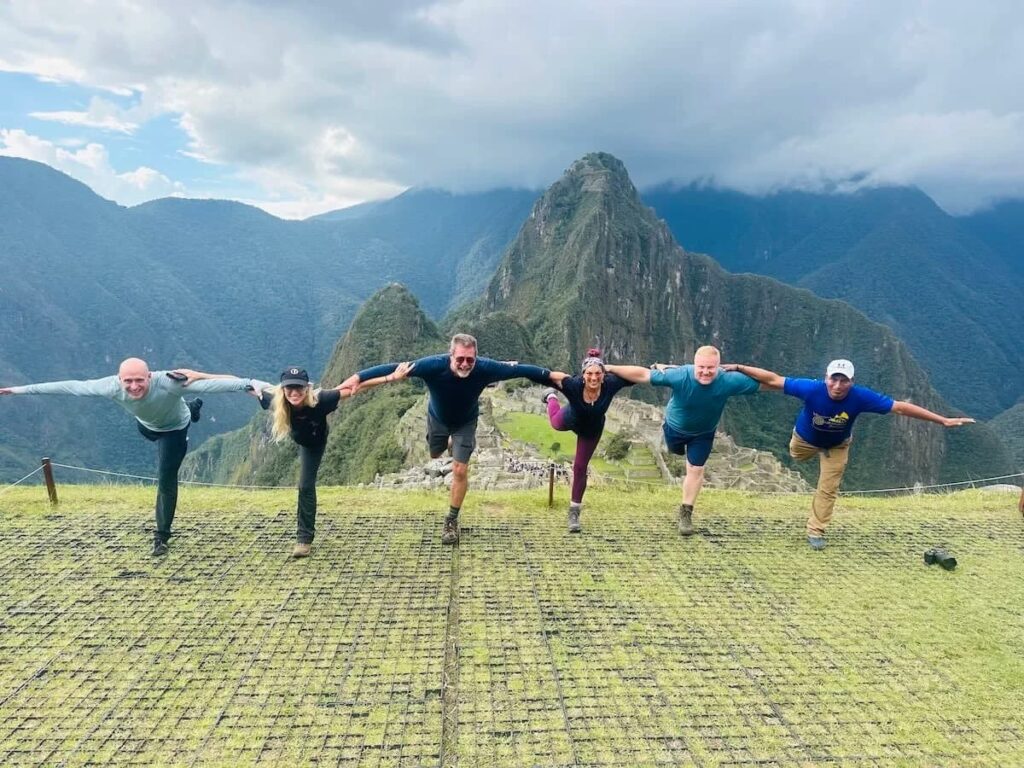 yoga+stretch+at+machu+picchu,+peru